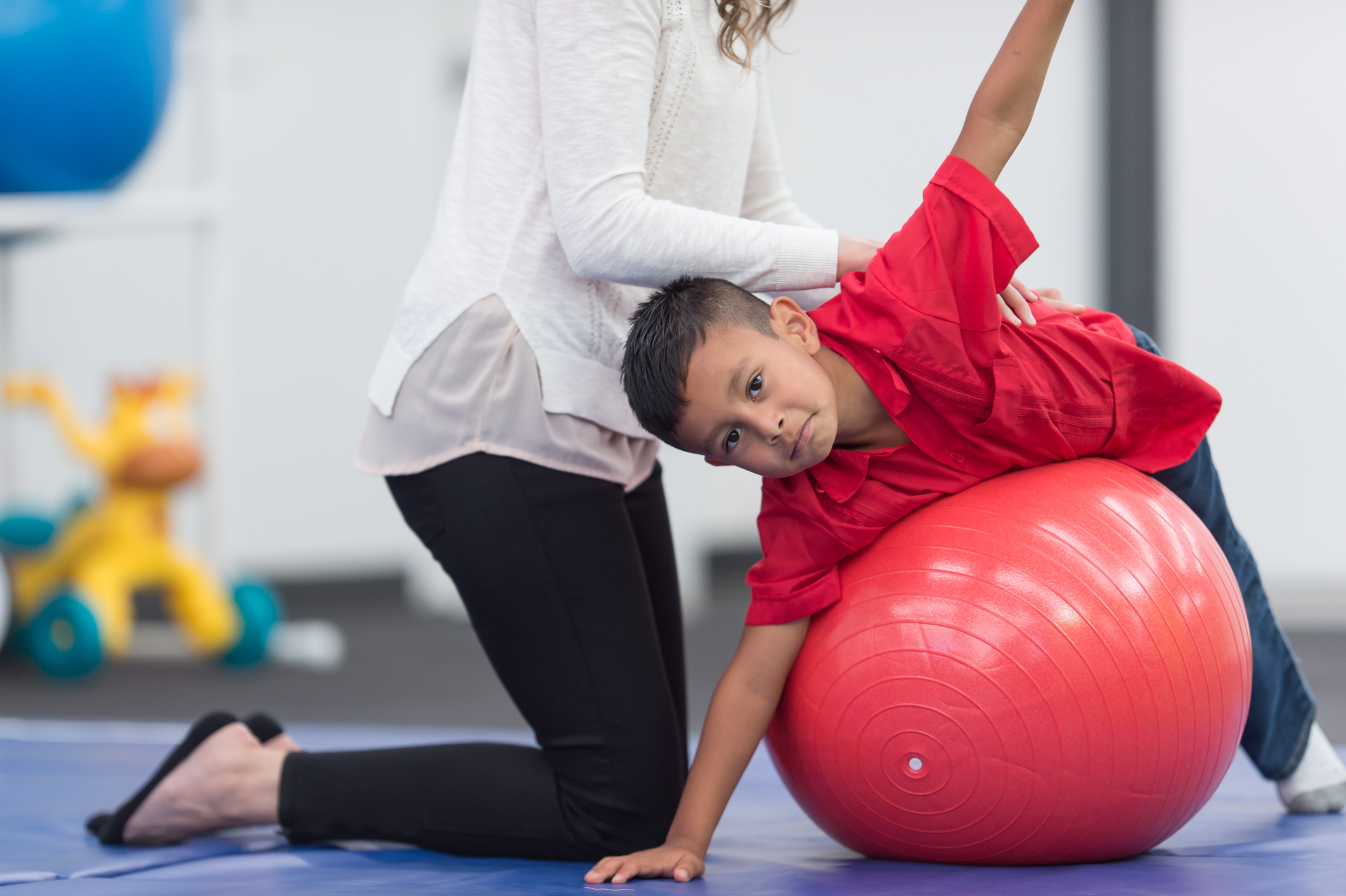 Exercising kids in physical therapy clinic Advance Medical